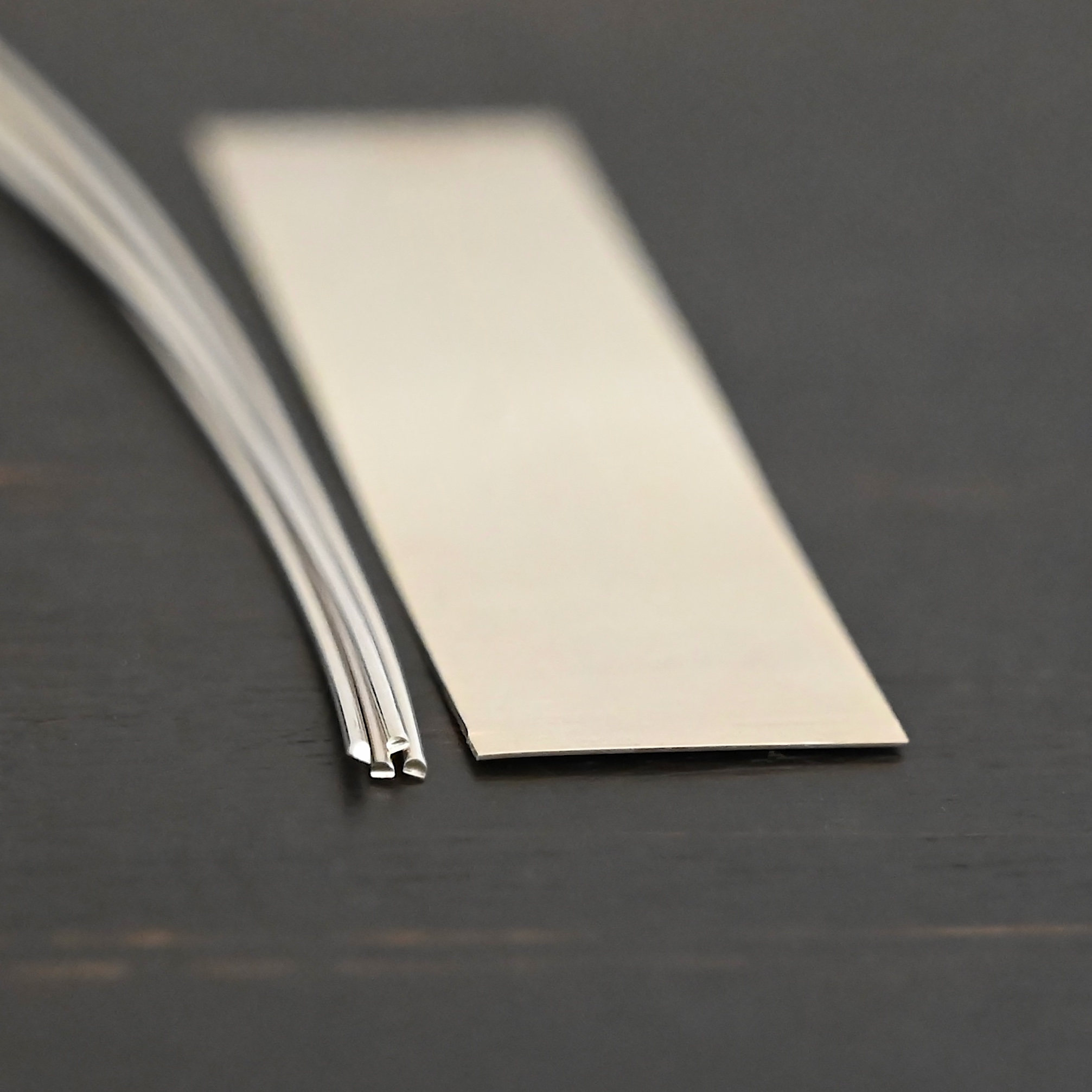 Silver Solder Silver Solder Sheet & Wire on dark background