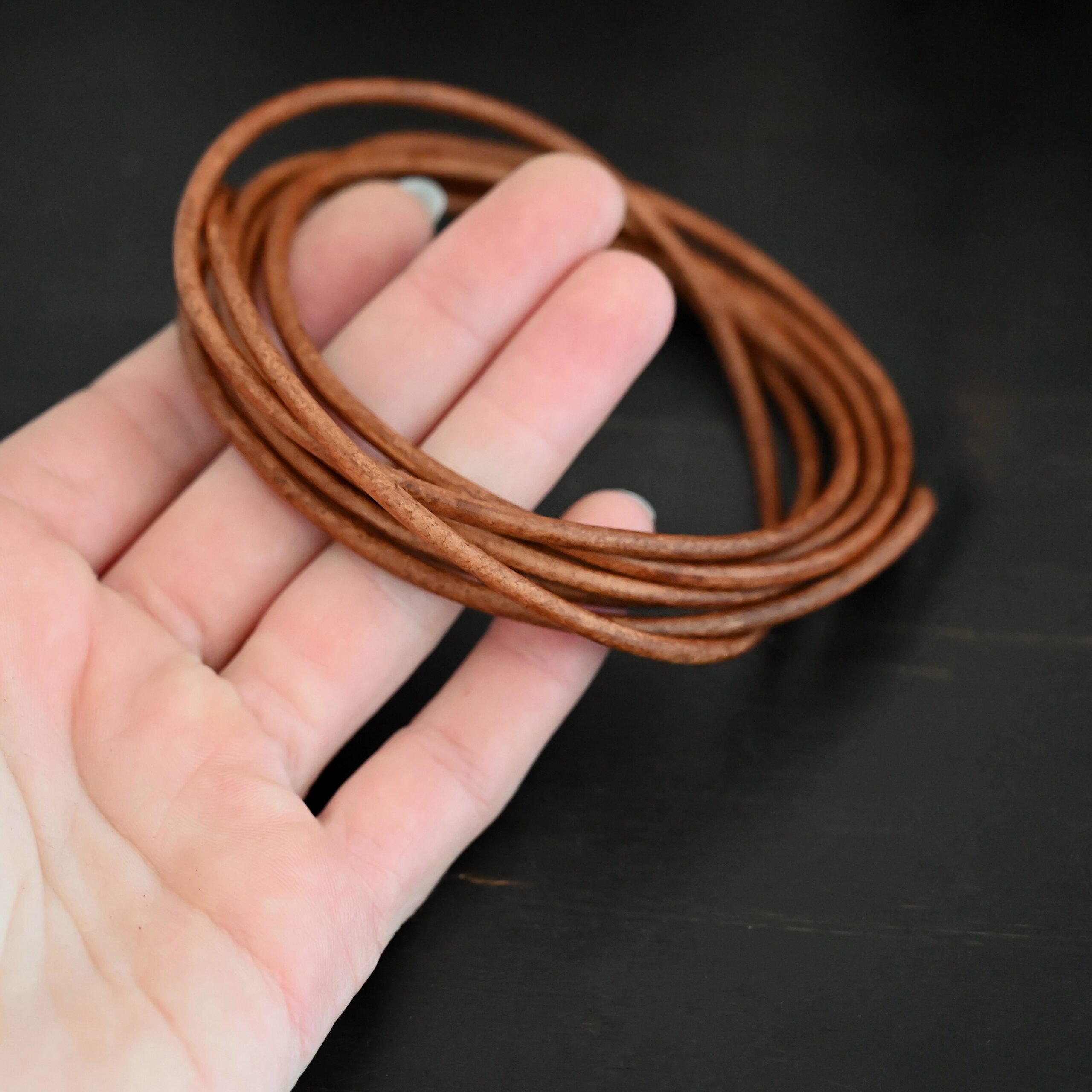 Genuine Natural 3mm light brown leather in hand