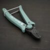Power Max Full Flush Cutting Pliers - Turquoise plastic handle shown on dark background