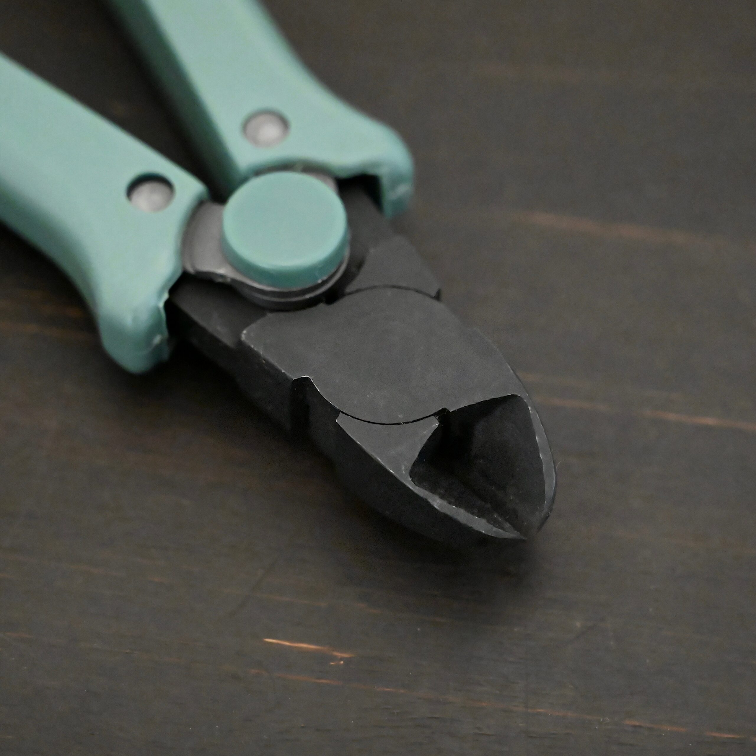 Felix Flush Cutting Pliers Power Max Full Flush Cutting Pliers - Turquoise plastic handle shown on dark background