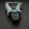 Power Max Full Flush Cutting Pliers - Turquoise plastic handle shown on dark background