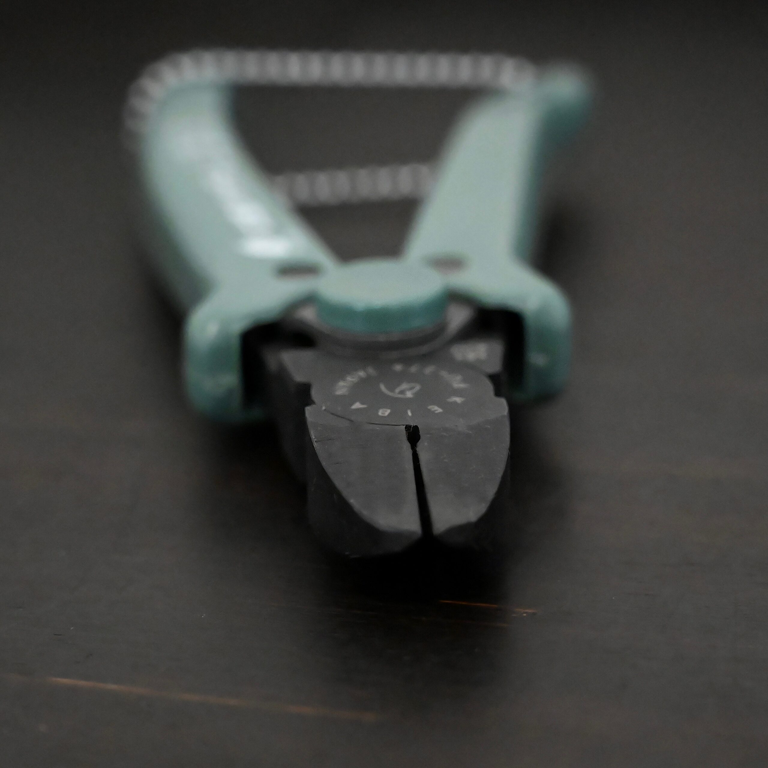 Felix Flush Cutting Pliers Power Max Full Flush Cutting Pliers - Turquoise plastic handle shown on dark background