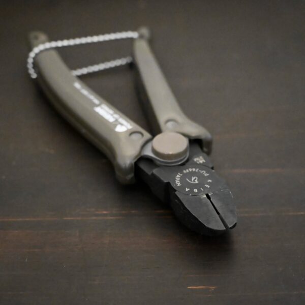 Power Max Full Flush Cutting Pliers - Grey plastic handle shown on dark background