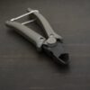 Power Max Full Flush Cutting Pliers - Grey plastic handle shown on dark background