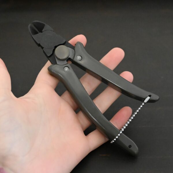 Power Max Full Flush Cutting Pliers - Grey plastic handle shown in hand