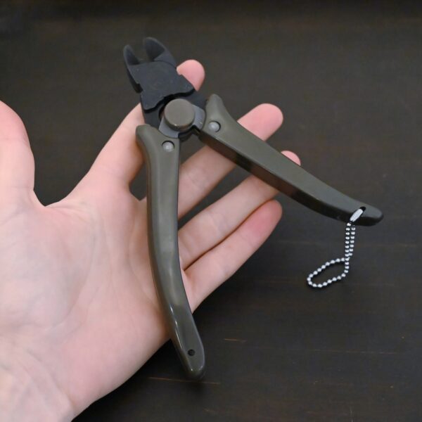 Power Max Full Flush Cutting Pliers - Grey plastic handle shown in hand