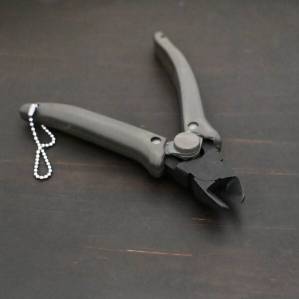 Power Max Full Flush Cutting Pliers - Grey plastic handle shown on dark background