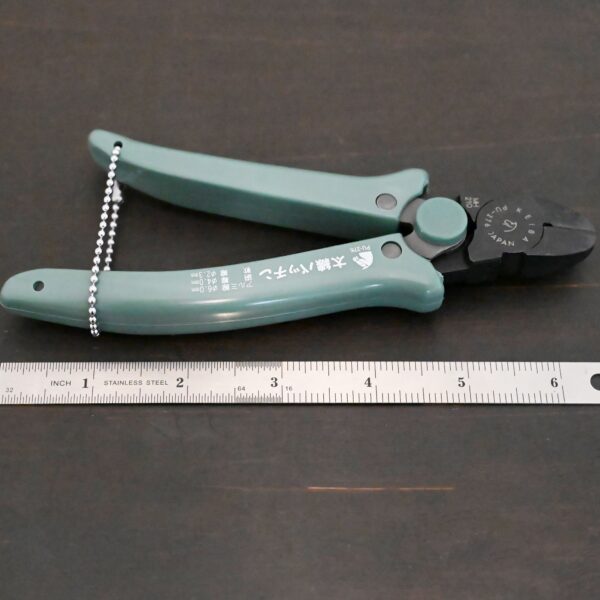 Power Max Full Flush Cutting Pliers - Turquoise plastic handle shown next to ruler