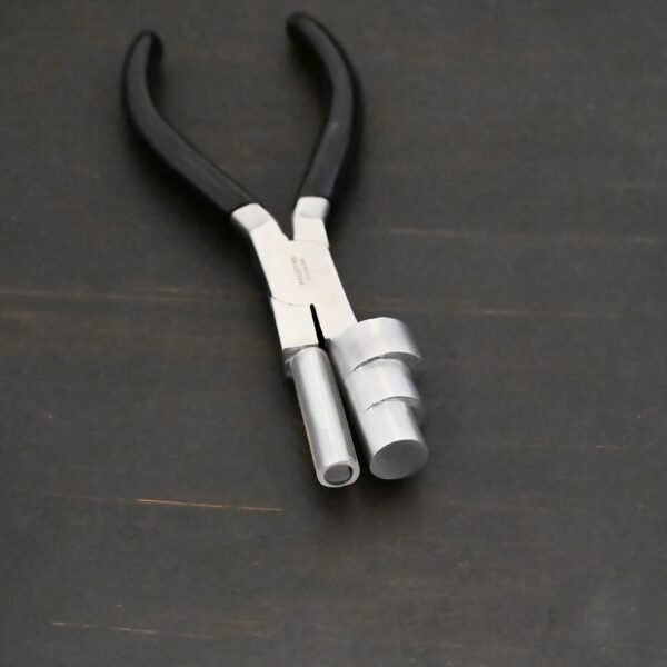 XL Stepped Mandrel Pliers - Black rubber handle shown on dark background