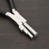 Large stepped mandrel pliers - black rubber handle shown on dark background