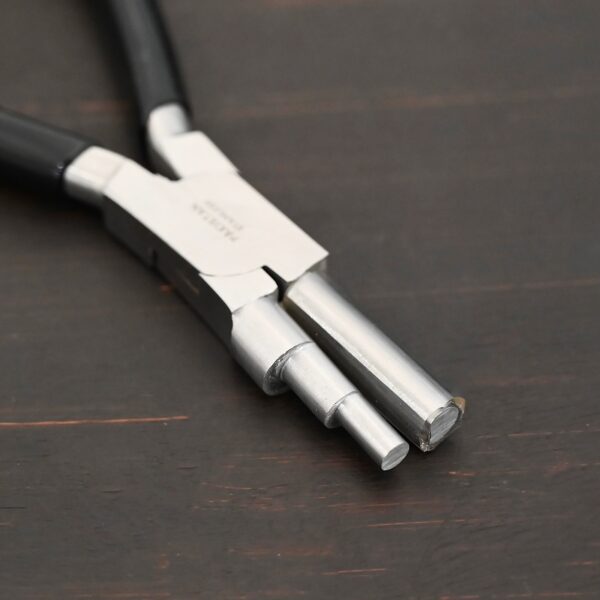 Large stepped mandrel pliers - black rubber handle shown on dark background