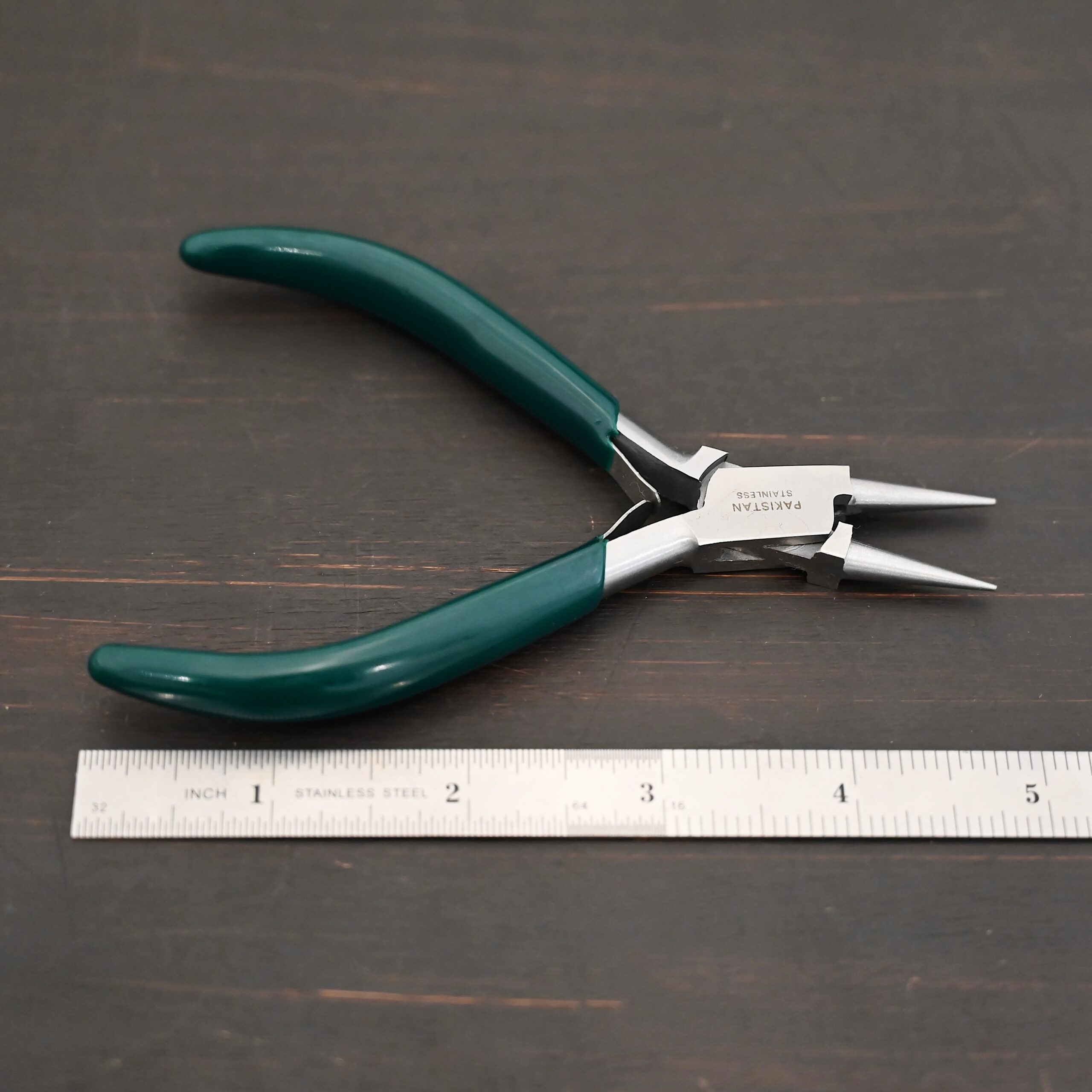 Wire Wrapping pliers - Dark Green rubber handle shown by ruler