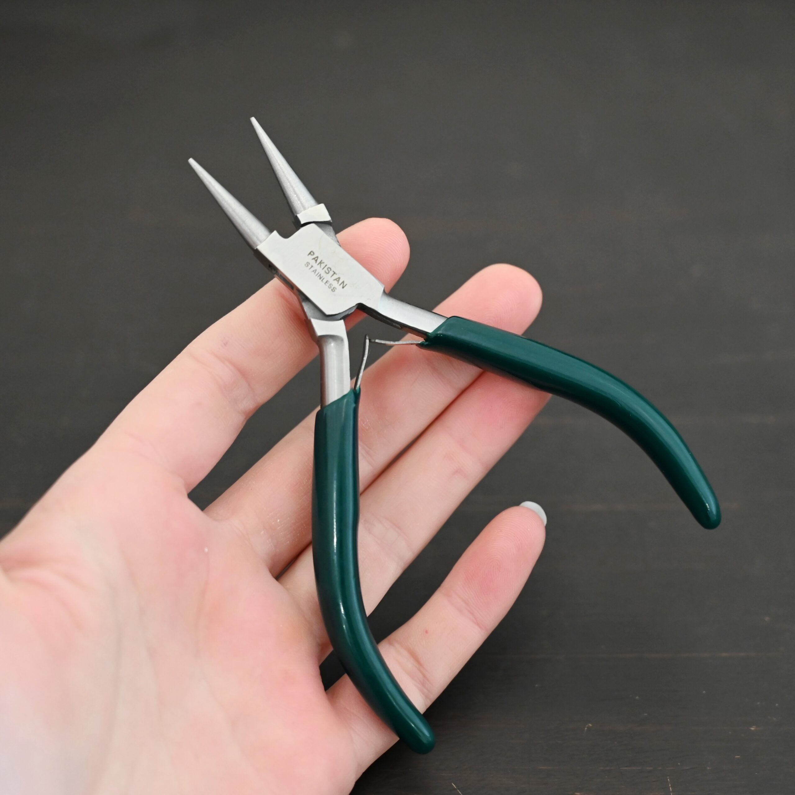 Wire Wrapping pliers - Dark Green rubber handle shown in hand