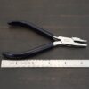 Small Stepped Mandrel pliers - Black rubber handle shown by ruler