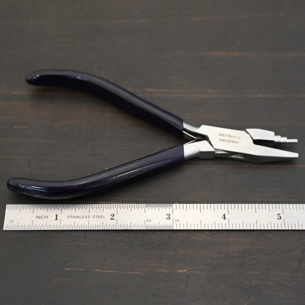 Small Stepped Mandrel pliers - Black rubber handle shown by ruler