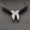Small Stepped Mandrel pliers - Black rubber handle shown on dark background