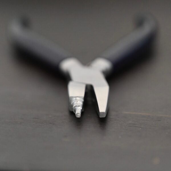 Small Stepped Mandrel pliers - Black rubber handle shown on dark background