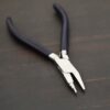 Small Stepped Mandrel pliers - Black rubber handle shown on dark background