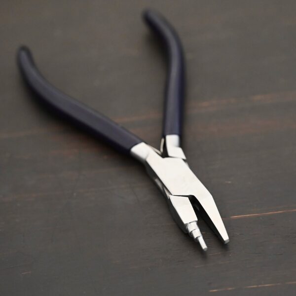 Small Stepped Mandrel pliers - Black rubber handle shown on dark background