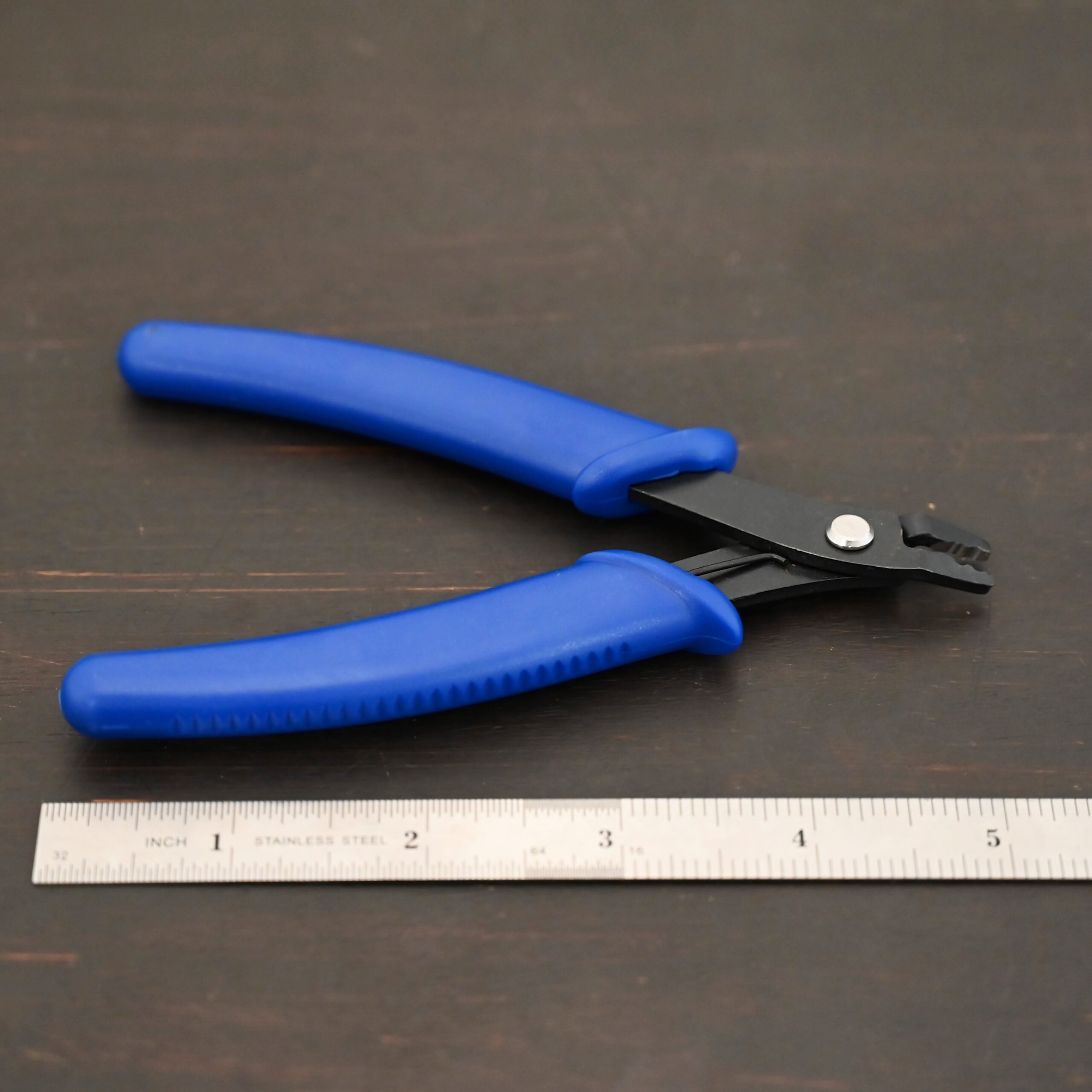 Crimping pliers - Blue Plastic handle shown by ruler