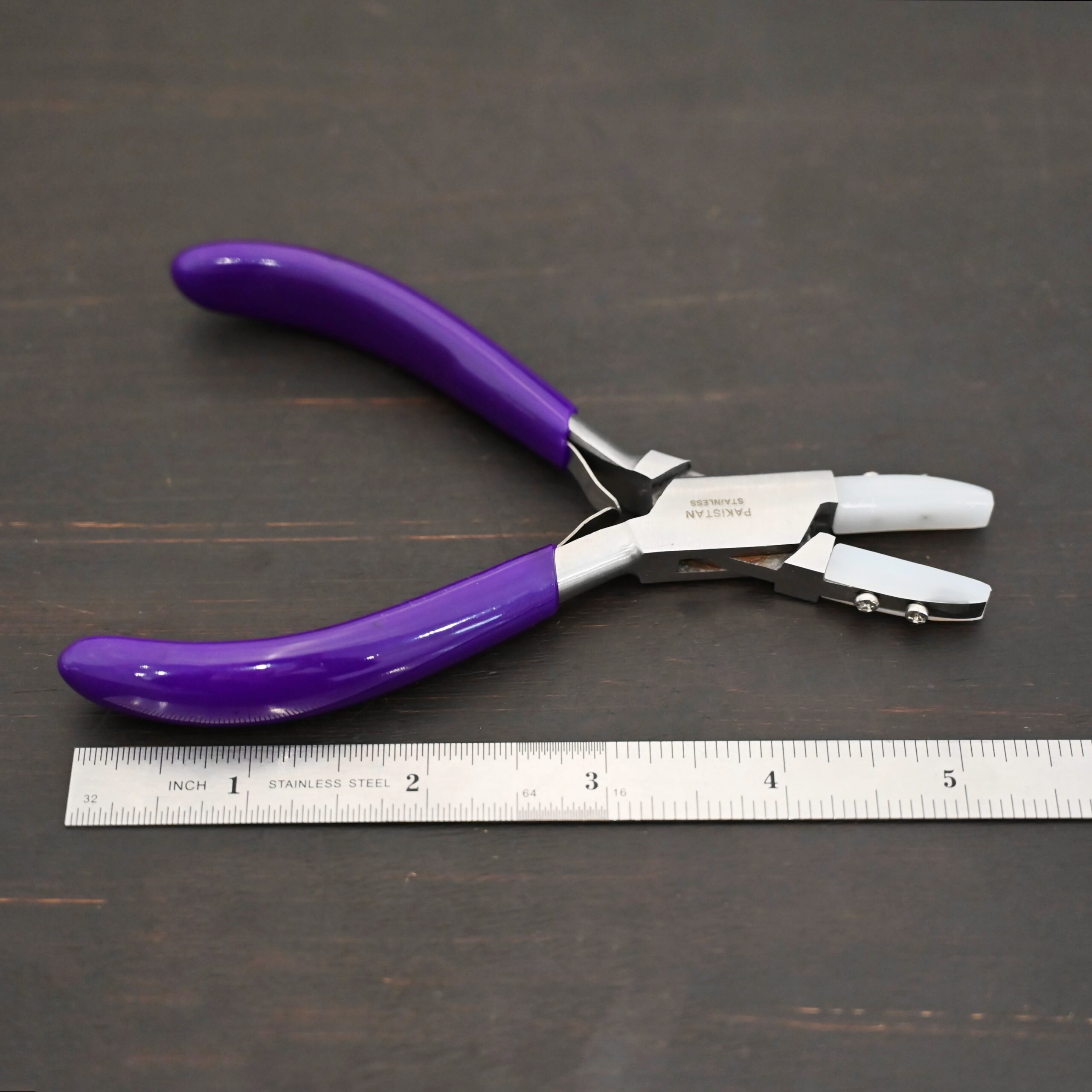 Nylon Jaw Pliers - Purple Rubber handle shown by ruler