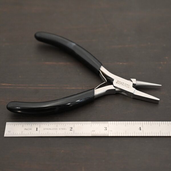 Round/Flat Nosed Pliers - Black Rubber handle shown by ruler