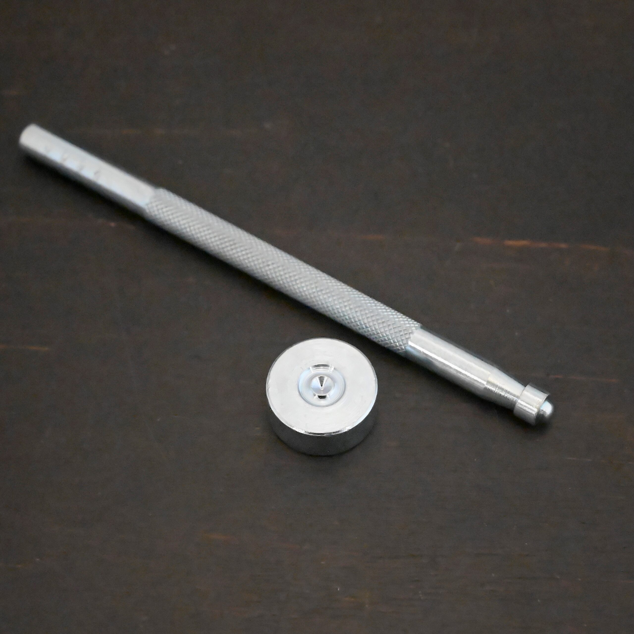 1/4" Rivet Setting Punch shown on dark background - stainless steel