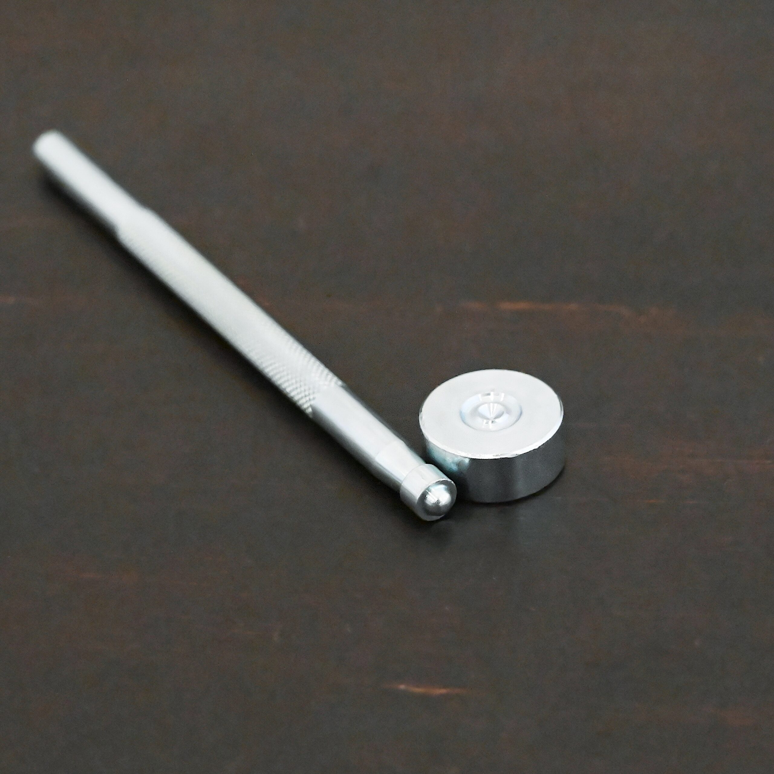 1/4" Rivet Setting Punch shown on dark background - stainless steel