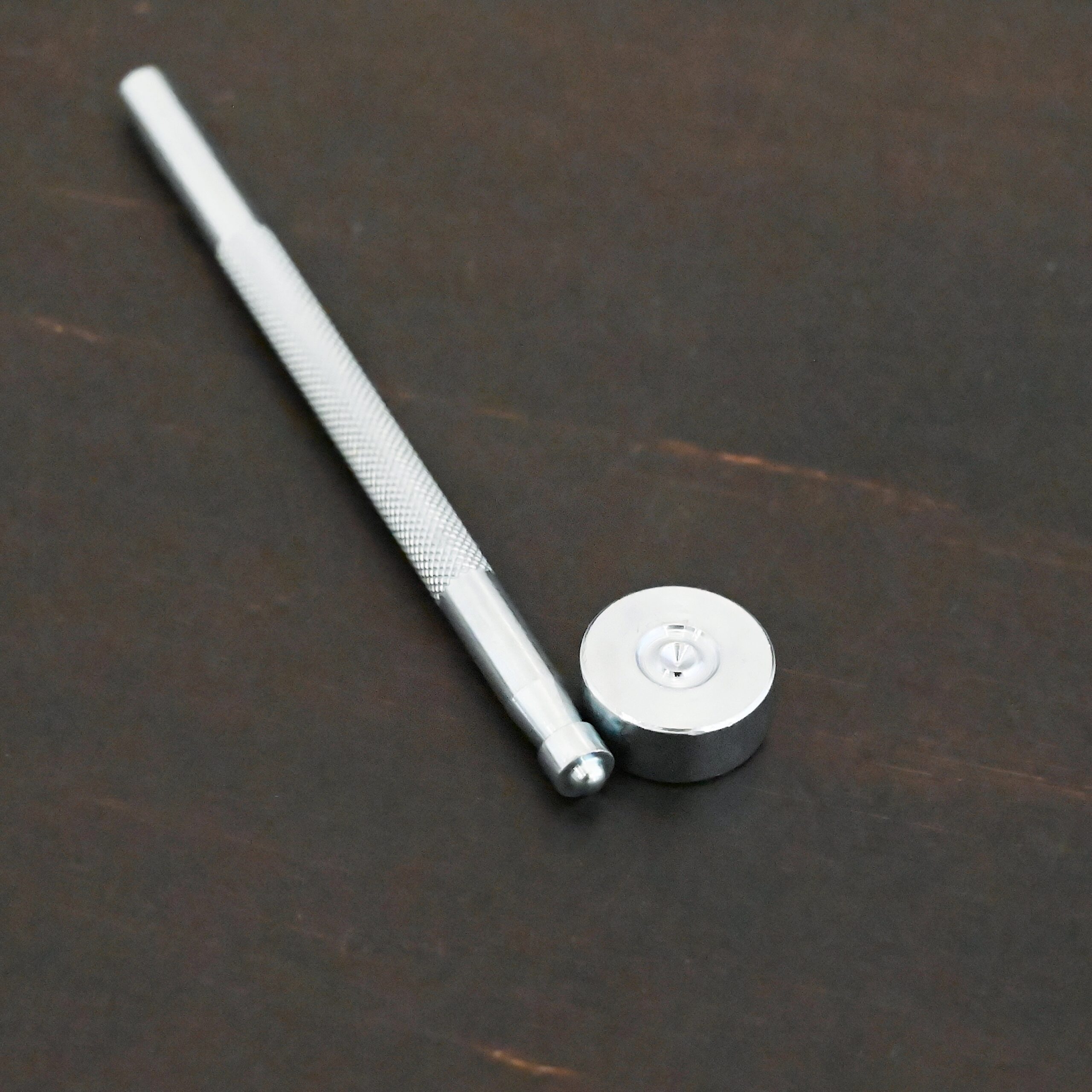 1/4" Rivet Setting Punch shown on dark background - stainless steel