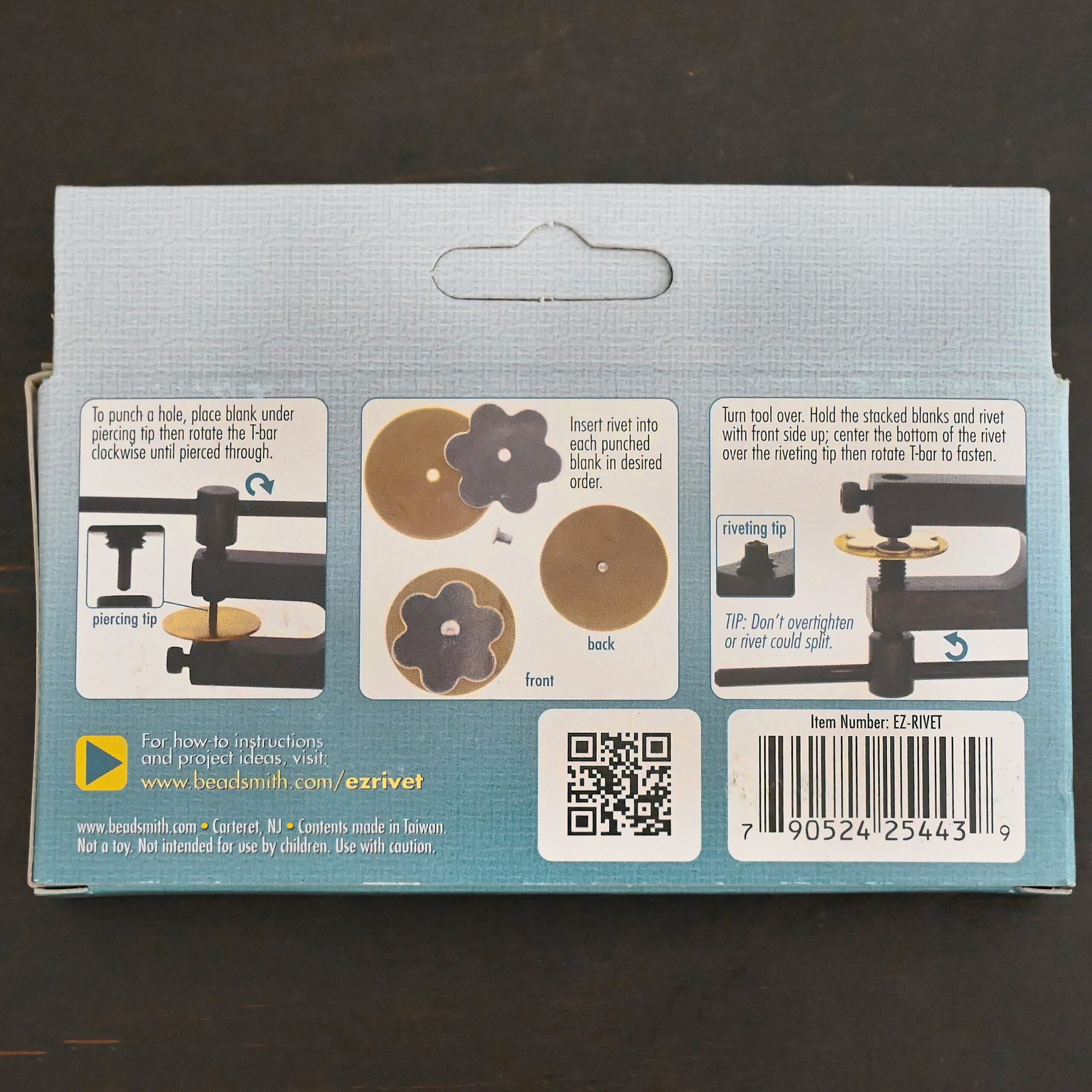 EZ Riveting Tool Complete Kit with back side of packaging shown on dark background