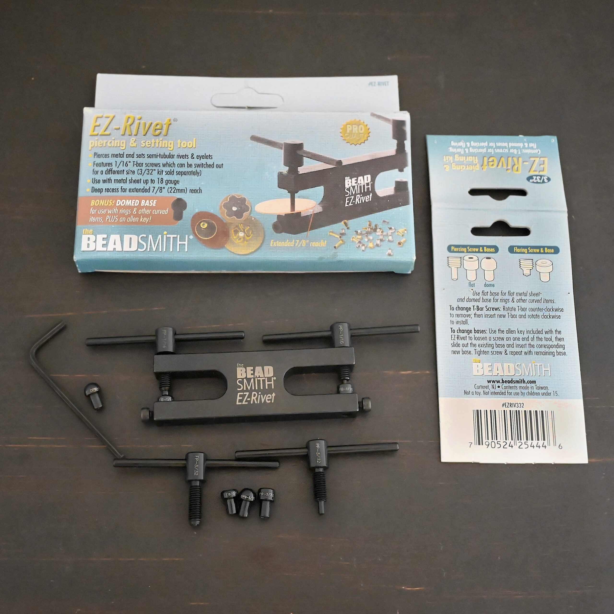 EZ Riveting Tool Complete Kit with packaging and all parts shown on dark background