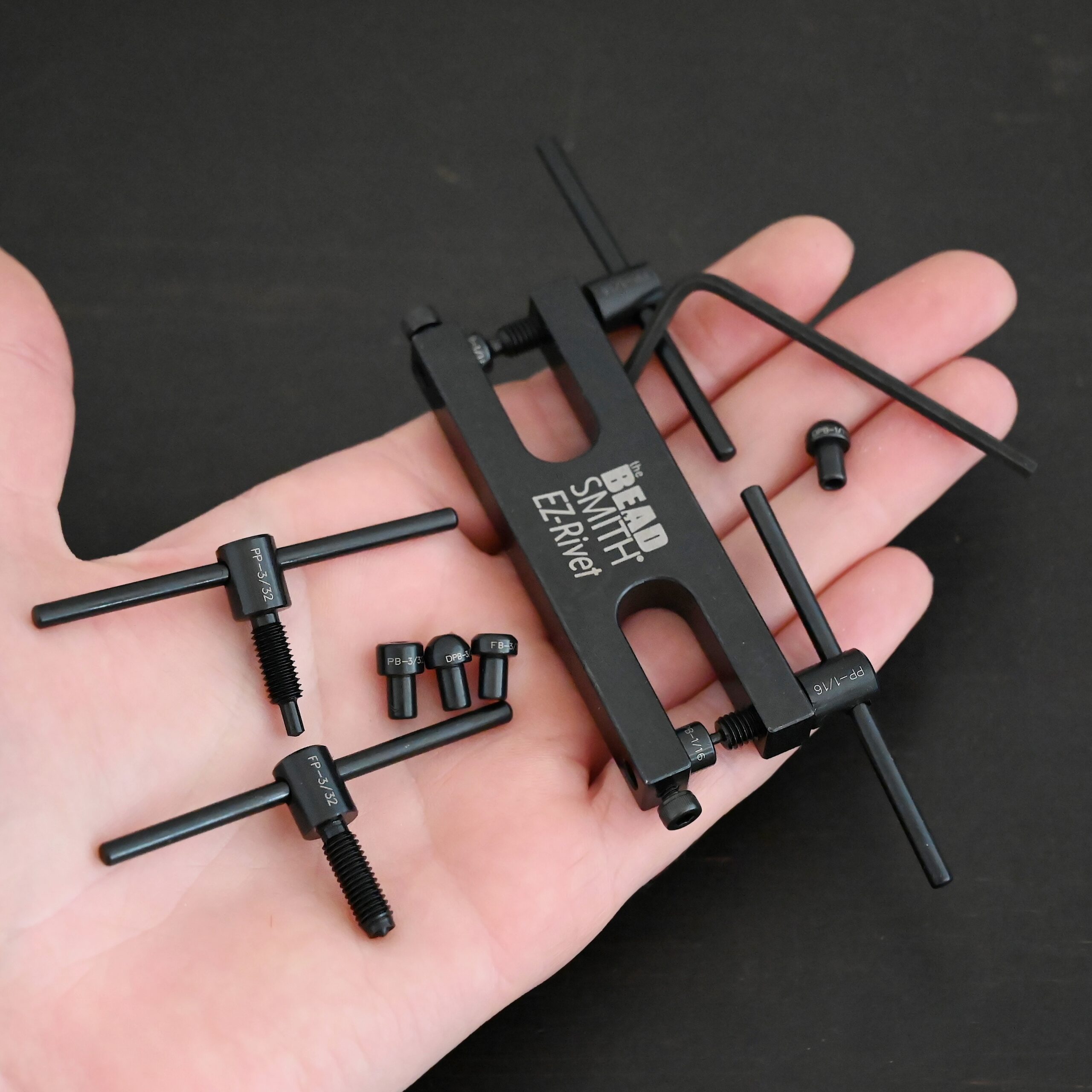 EZ Riveting Tool Complete Kit all parts shown in hand