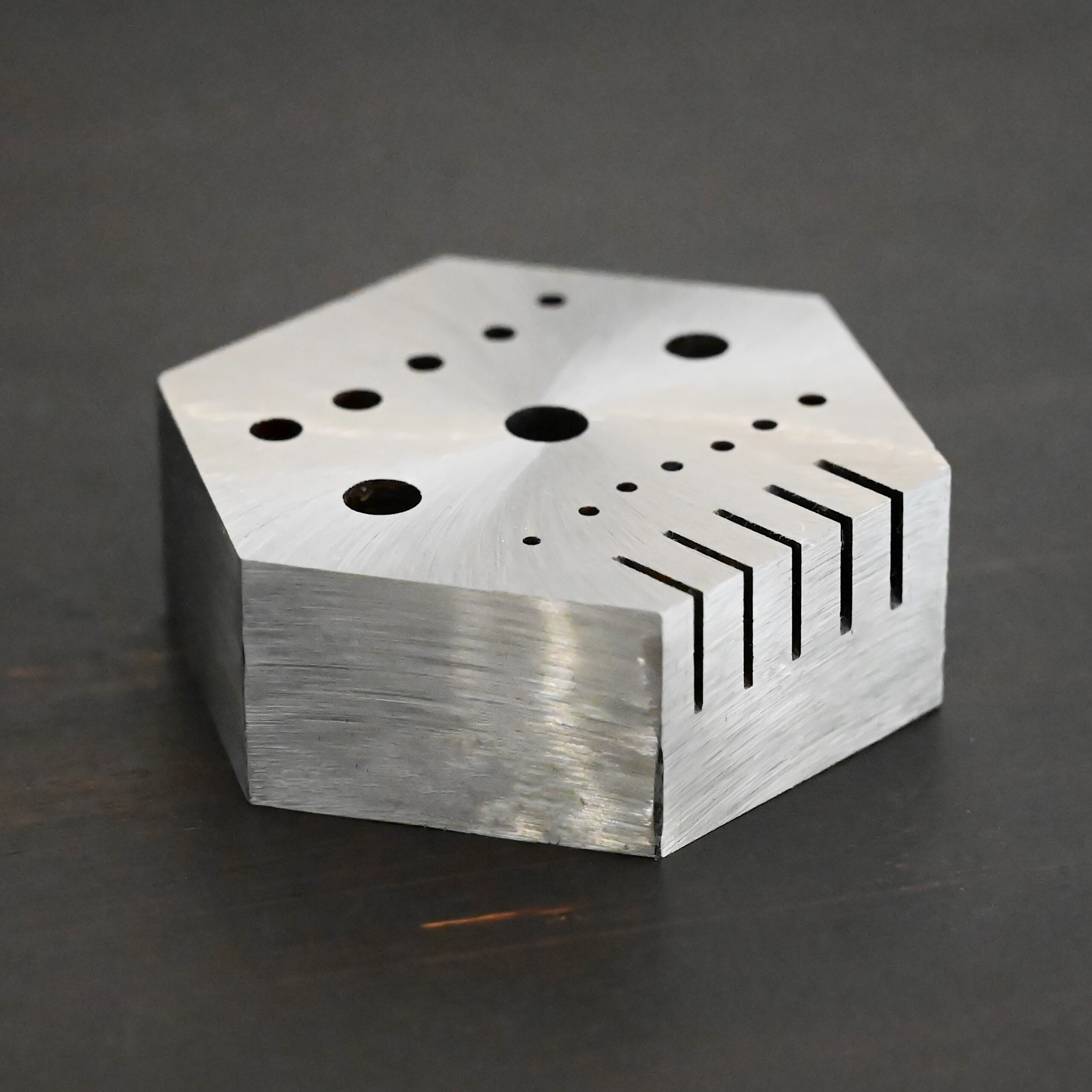 Hexagon Anvil - stainless steel shown on dark background