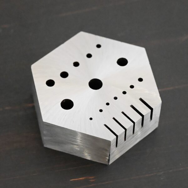 Hexagon Anvil - stainless steel shown on dark background