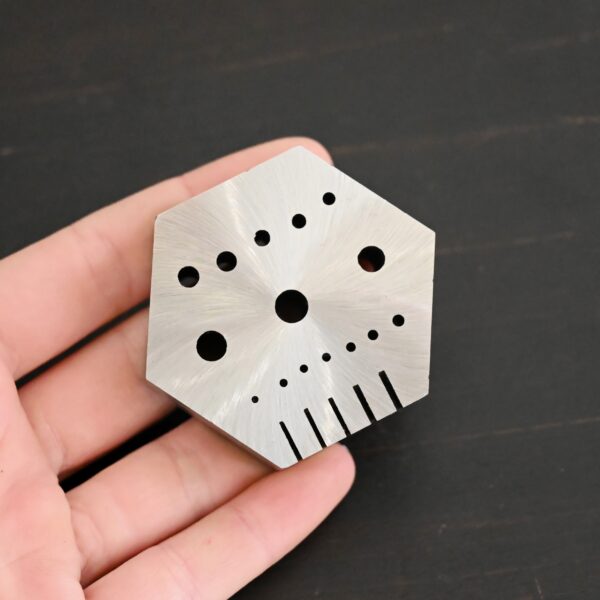 Hexagon Anvil - stainless steel shown in hand