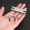 Stainless Steel Hole Punch & Twist Tool shown in hand