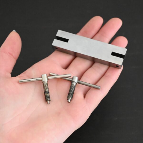 Stainless Steel Hole Punch & Twist Tool shown in hand