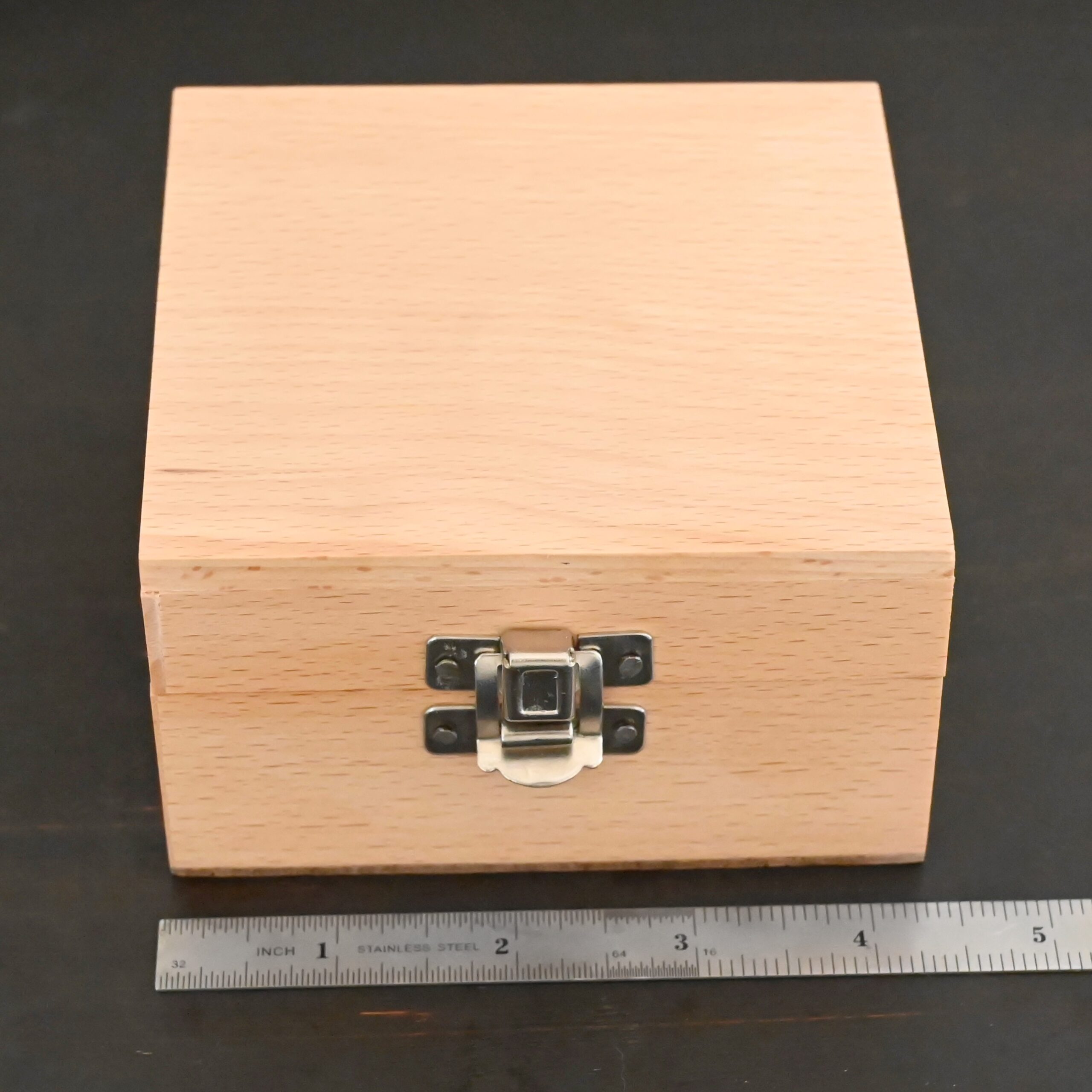 Stainless Steel Disc Cutter wooden box shown next to ruler