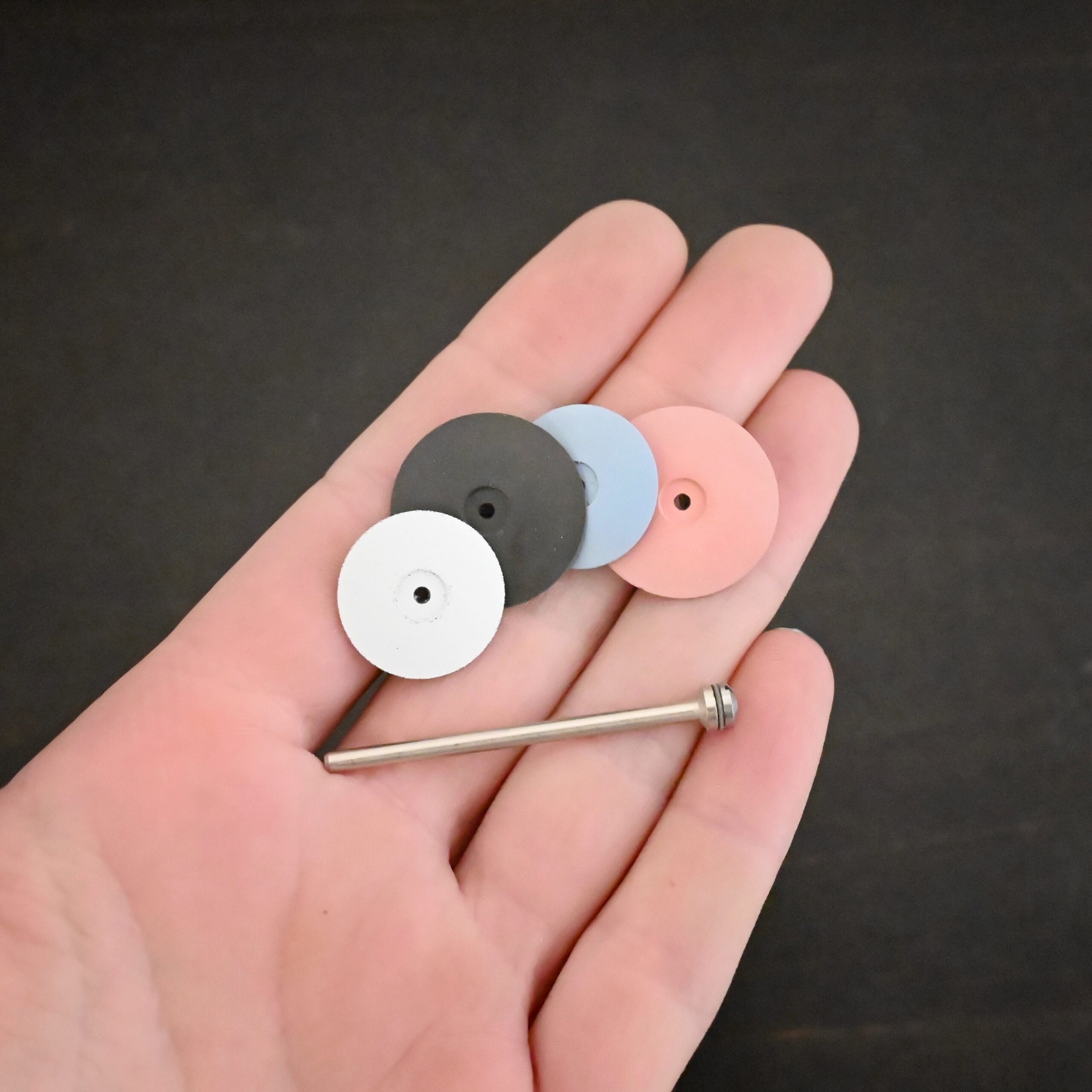 All Polishing Wheels & mandrel shown in hand