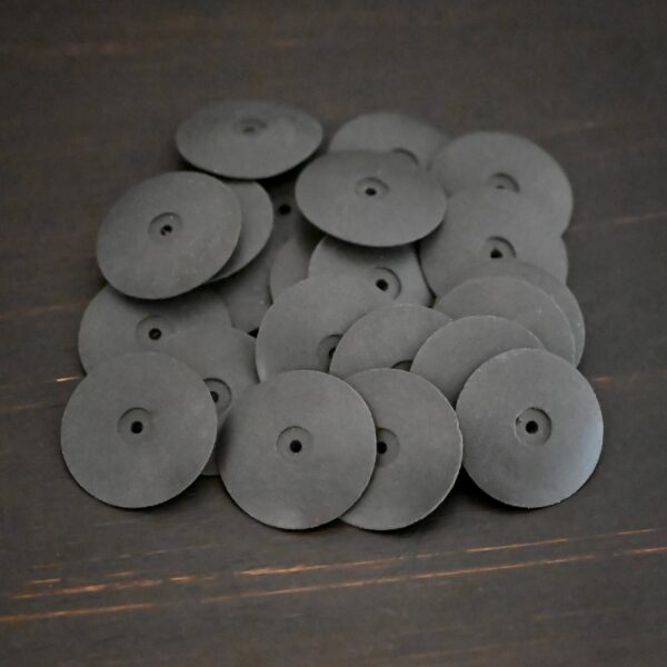 Black Polishing Wheels shown on dark background