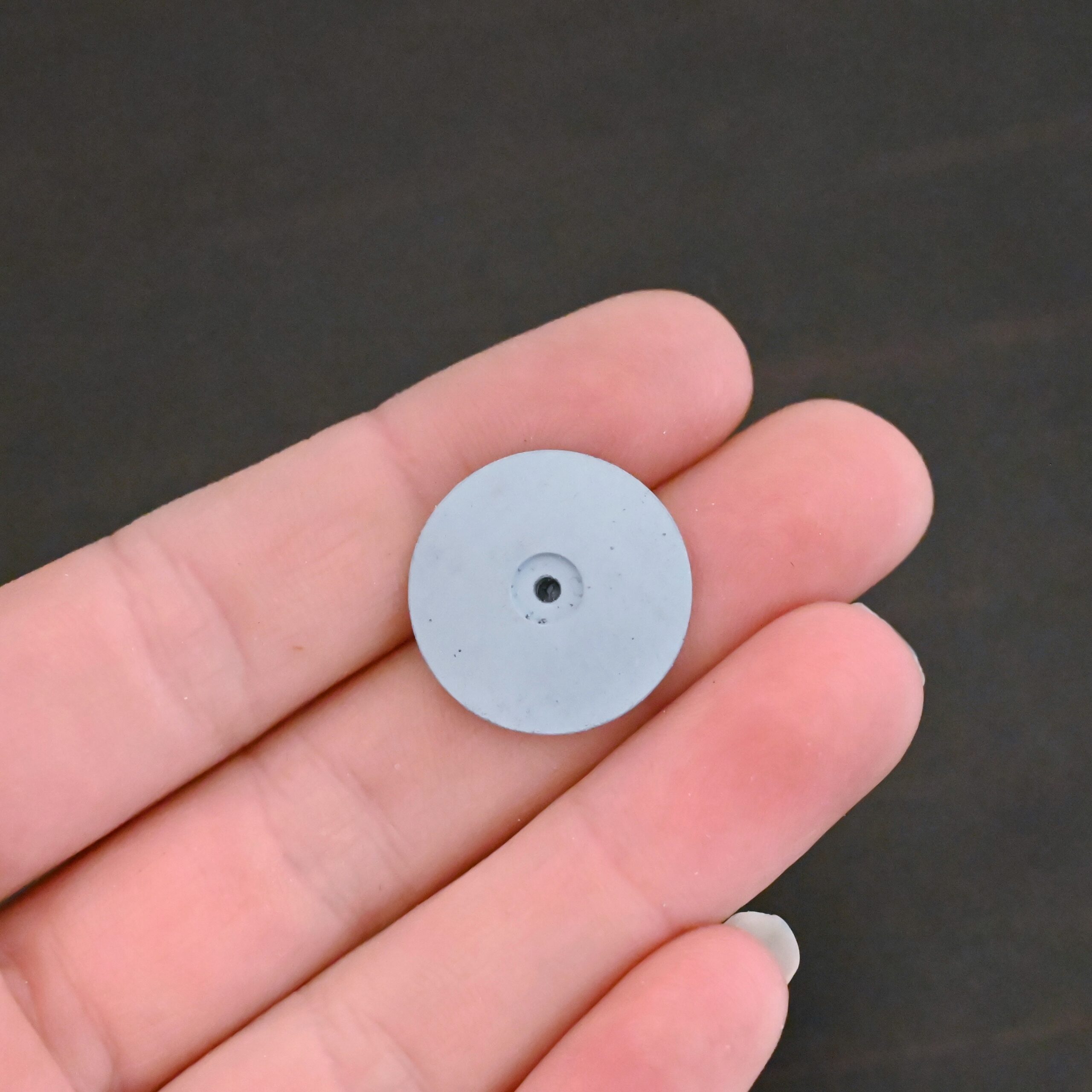 Blue Polishing Wheel shown in hand