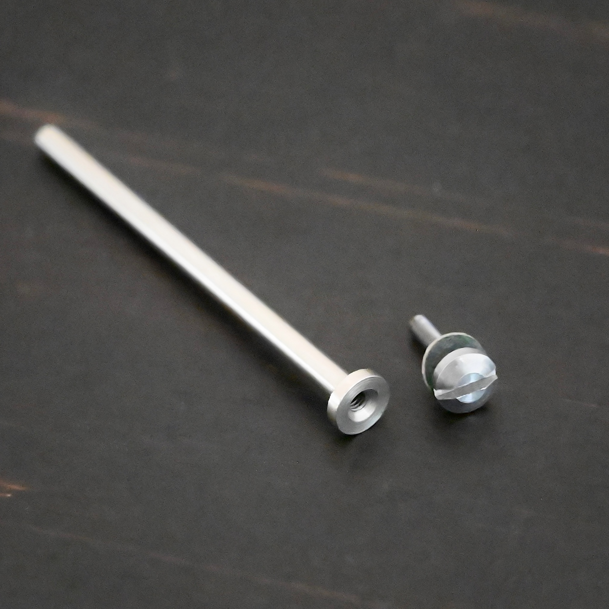 Stainless Steel Polishing Wheel Mandrel shown on dark background