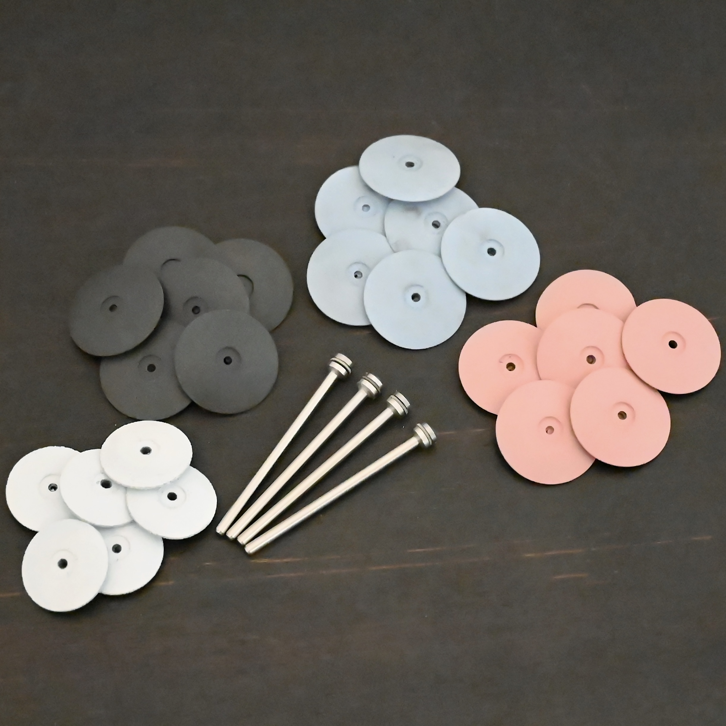 All Polishing Wheels & Mandrels shown on dark background