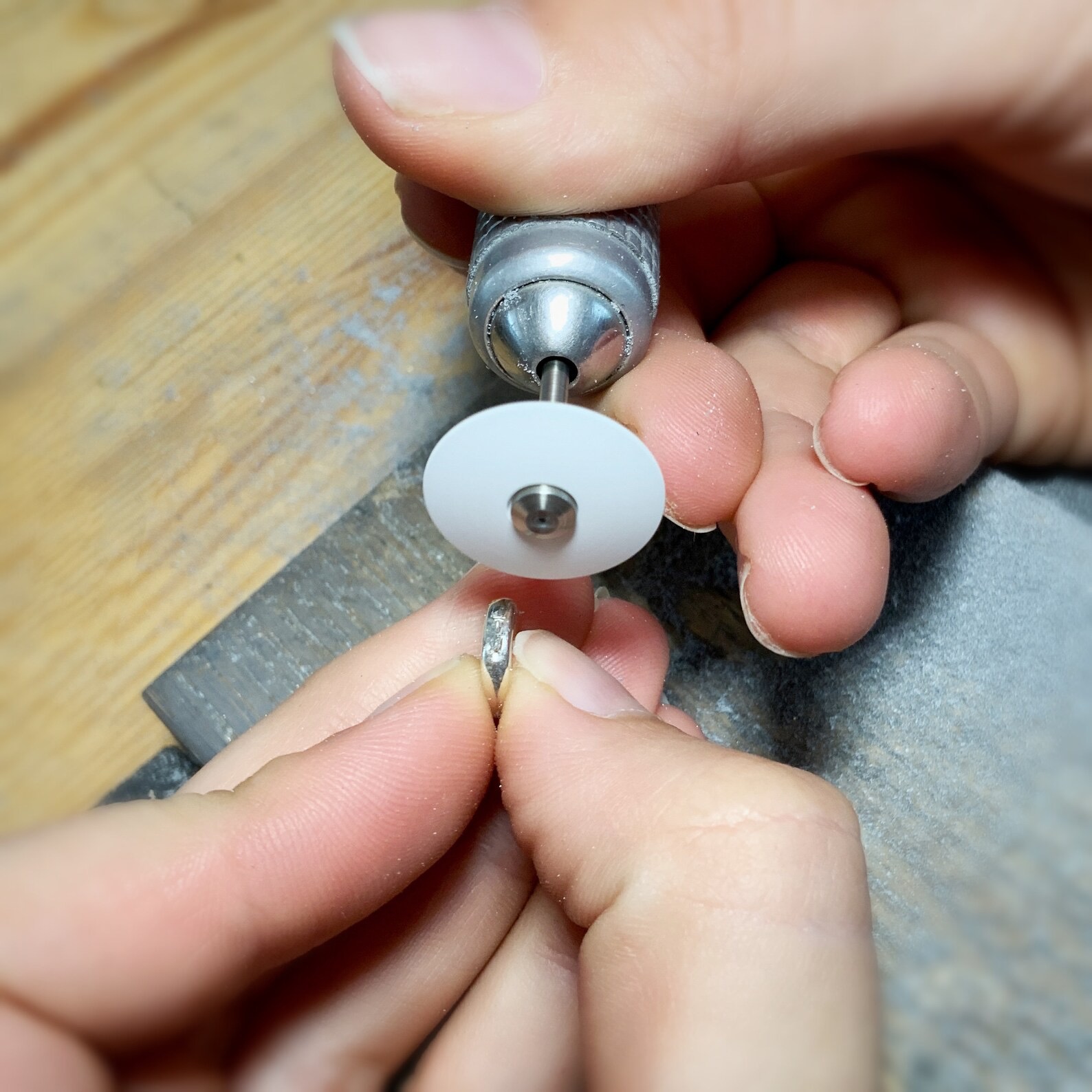 Showing Step 1 of Polishing stage with white wheel - most abrasive