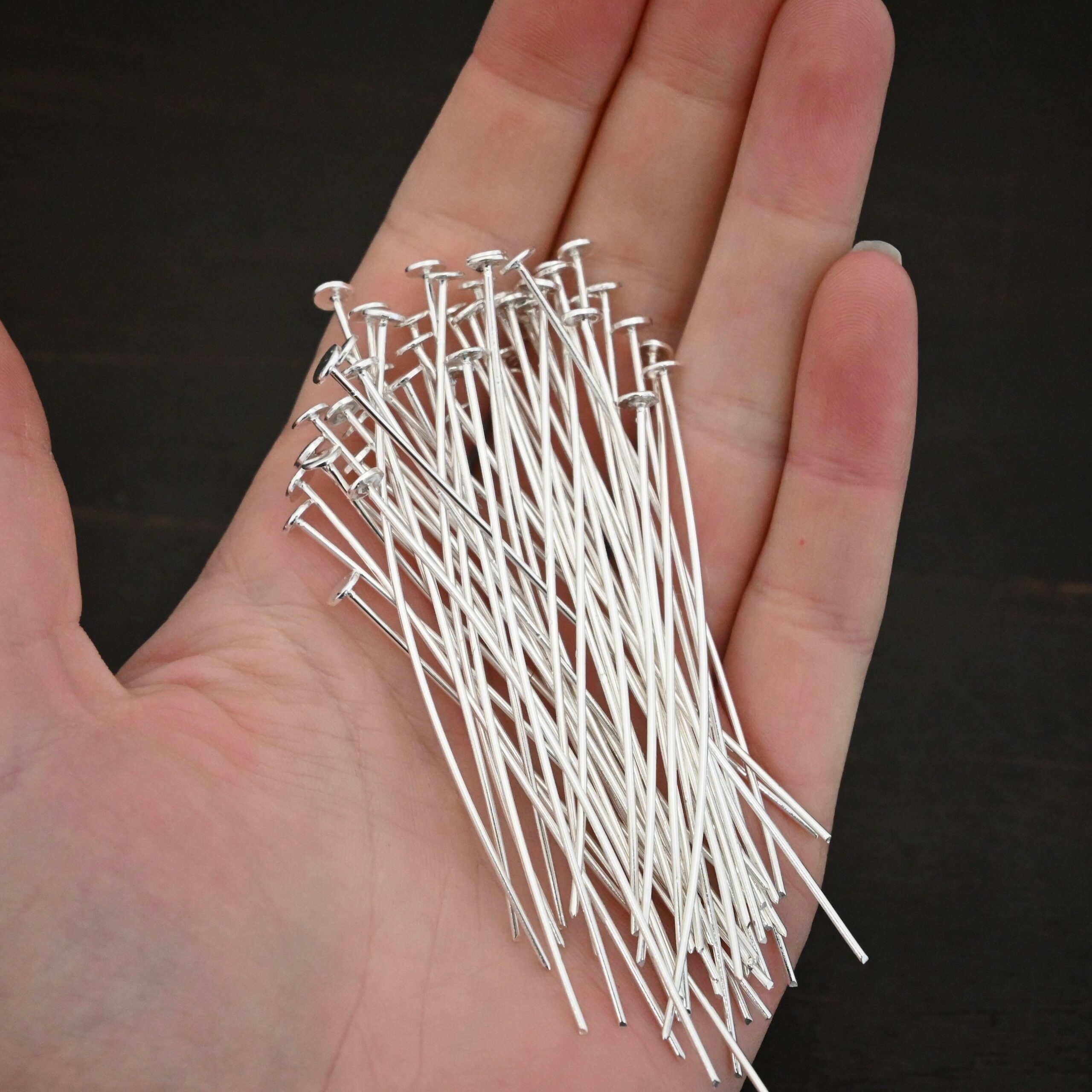 Silver Nail Headpins shown in hand