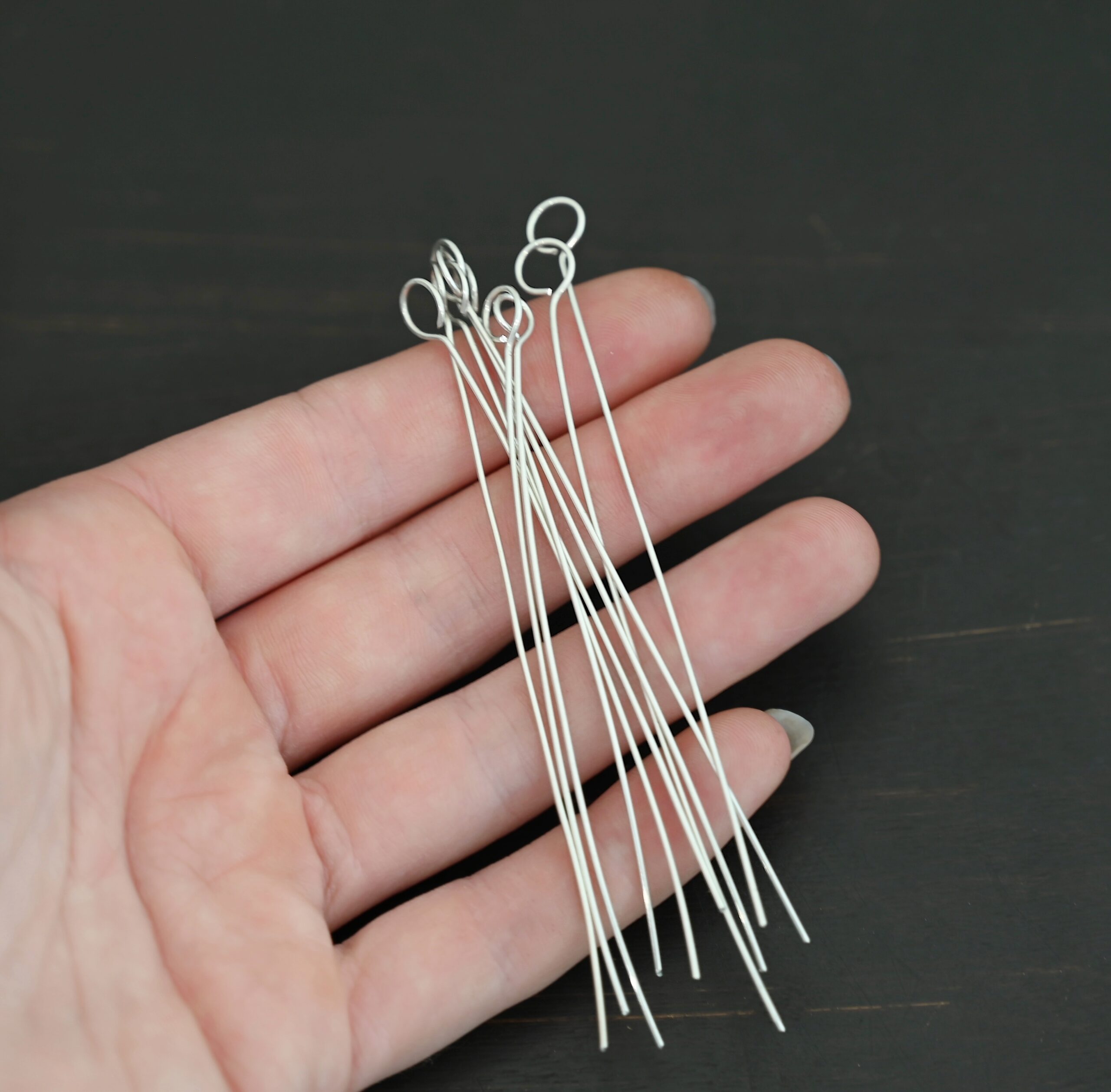 Eyepins shiny 10pcs shown in hand