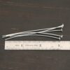 Nail Headpins shiny 5mm shown by ruler