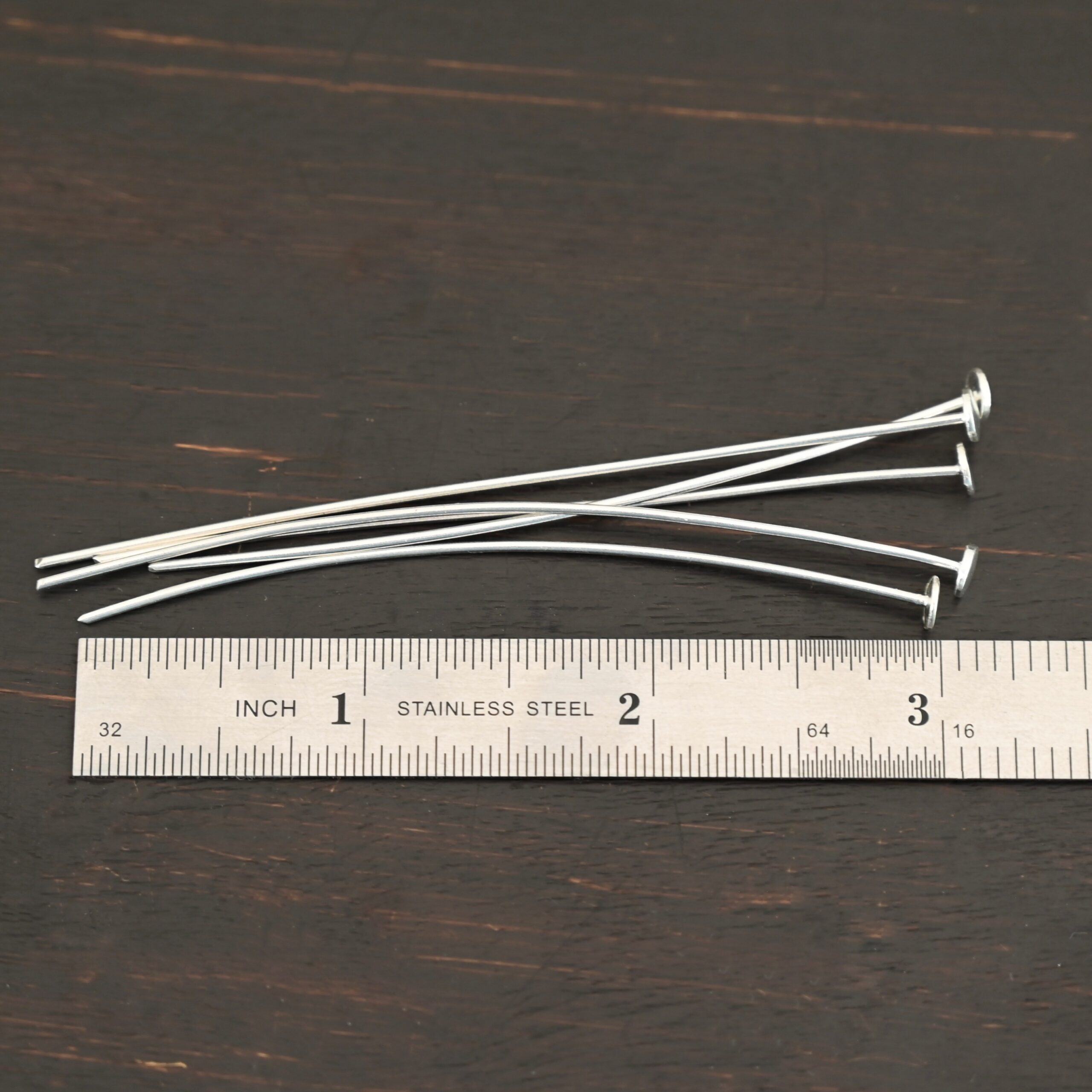 Nail Headpins shiny 5mm shown by ruler