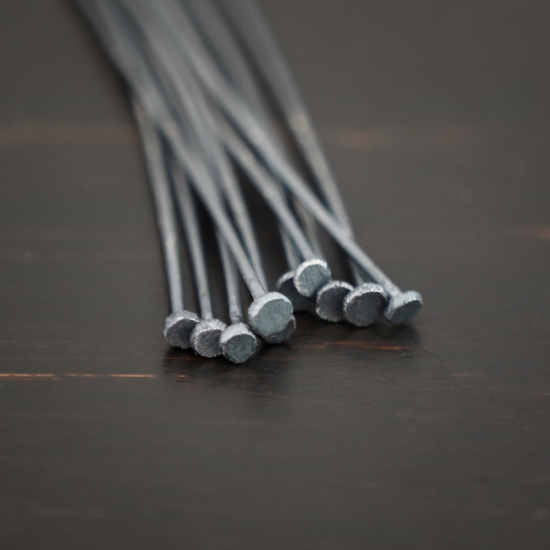 Large Bead Headpin oxidized 10pcs Large Bead Headpin oxidized 10pcs shown on dark background