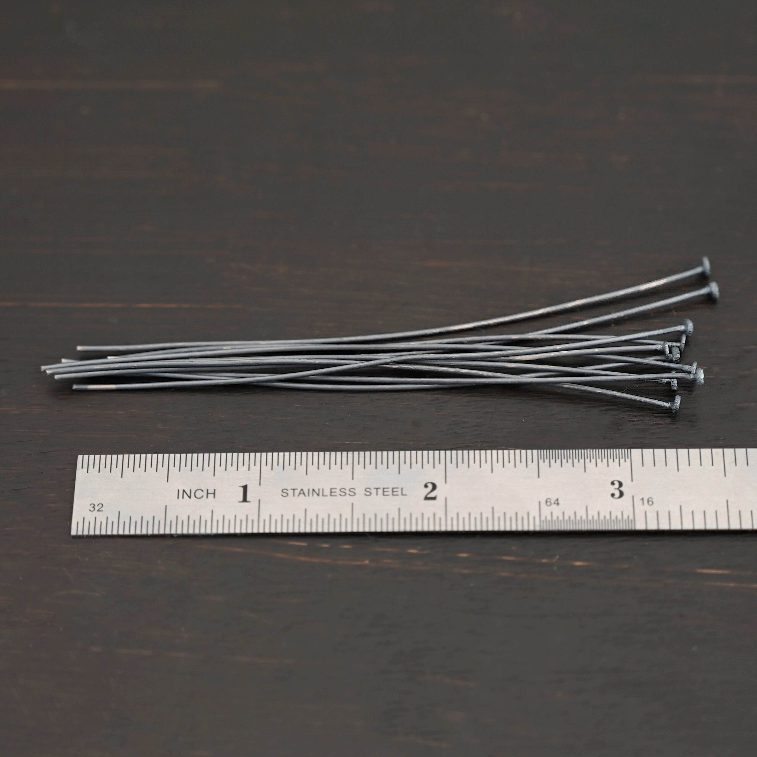 Large Bead Headpin oxidized 10pcs Large Bead Headpin oxidized 10pcs shown by ruler